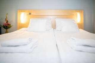 Отель Hotel Uusikuu Миккели Стандартный двухместный номер с 2 отдельными кроватями-28