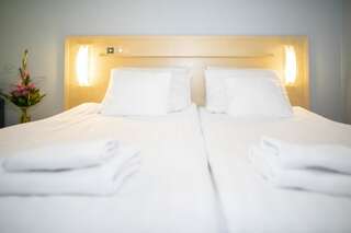 Отель Hotel Uusikuu Миккели Стандартный двухместный номер с 2 отдельными кроватями-8